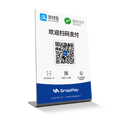 a small table signage that has alipay wechat pay and qr-code on it